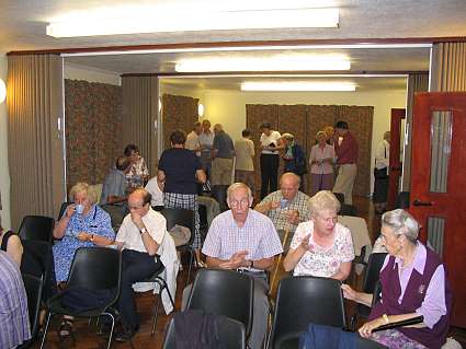 Audience enjoying a cup of tea & cakes