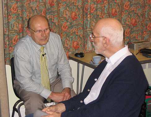 Peter talking to Norman